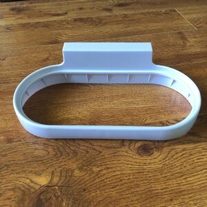 Plastic over the cabinet trash bag holder